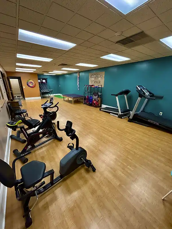 Fitness and recreation room with bikes and treadmills