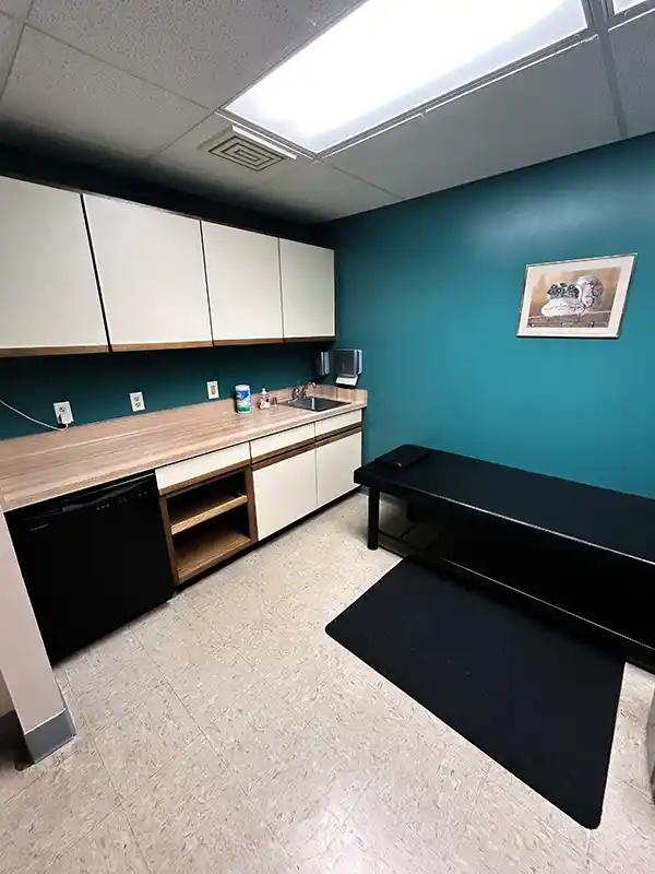 Personal care room with table and sink